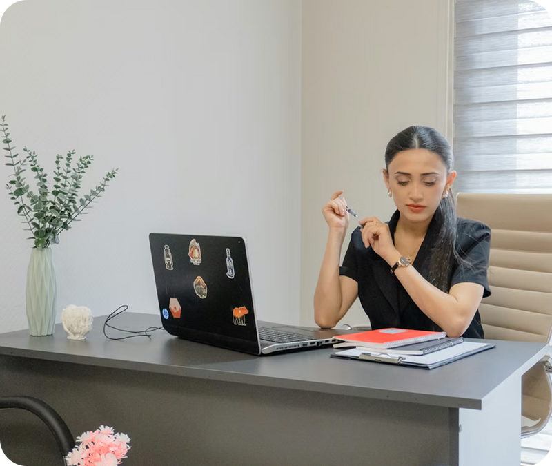 office girl sit on table